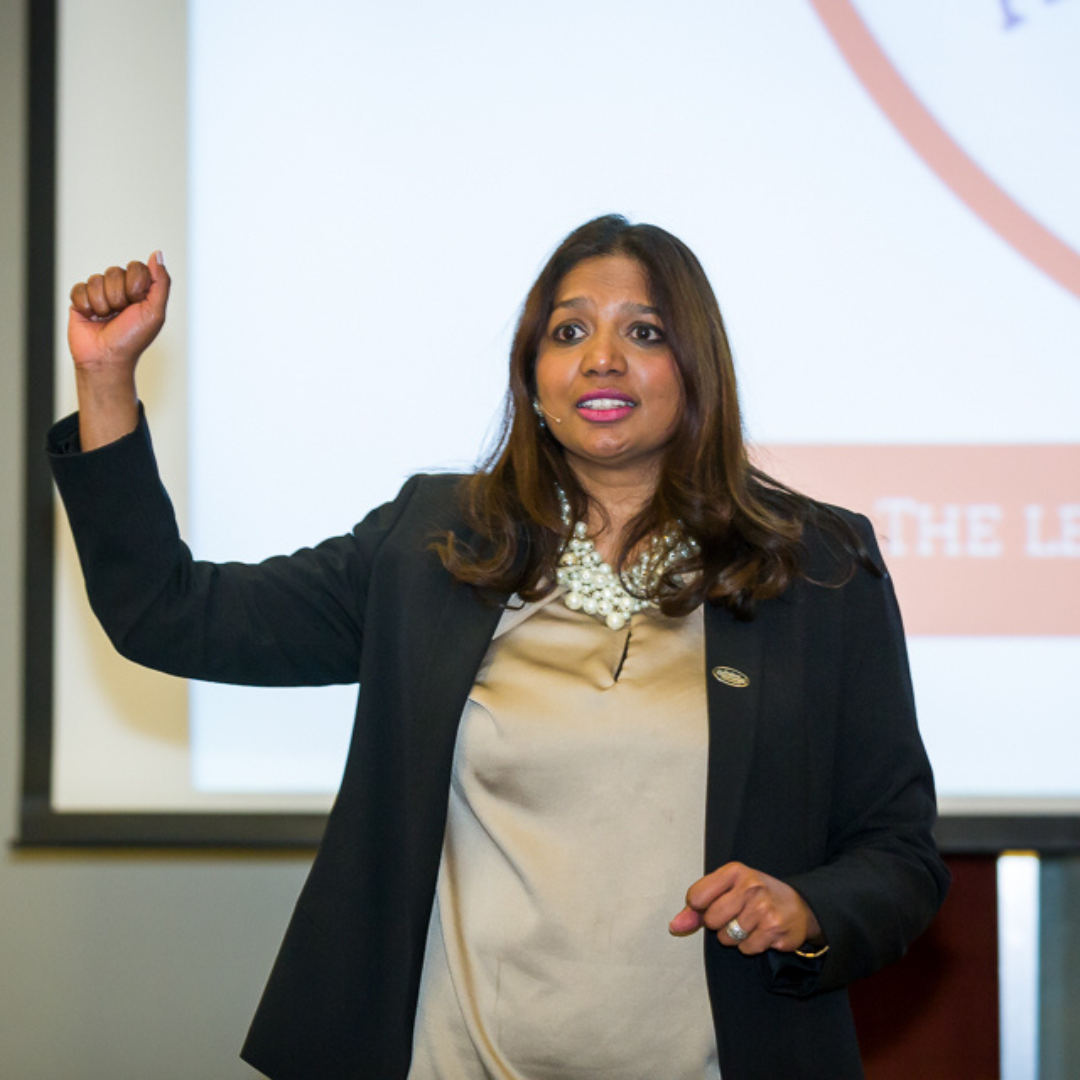 Elaine Jacob speaking on stage